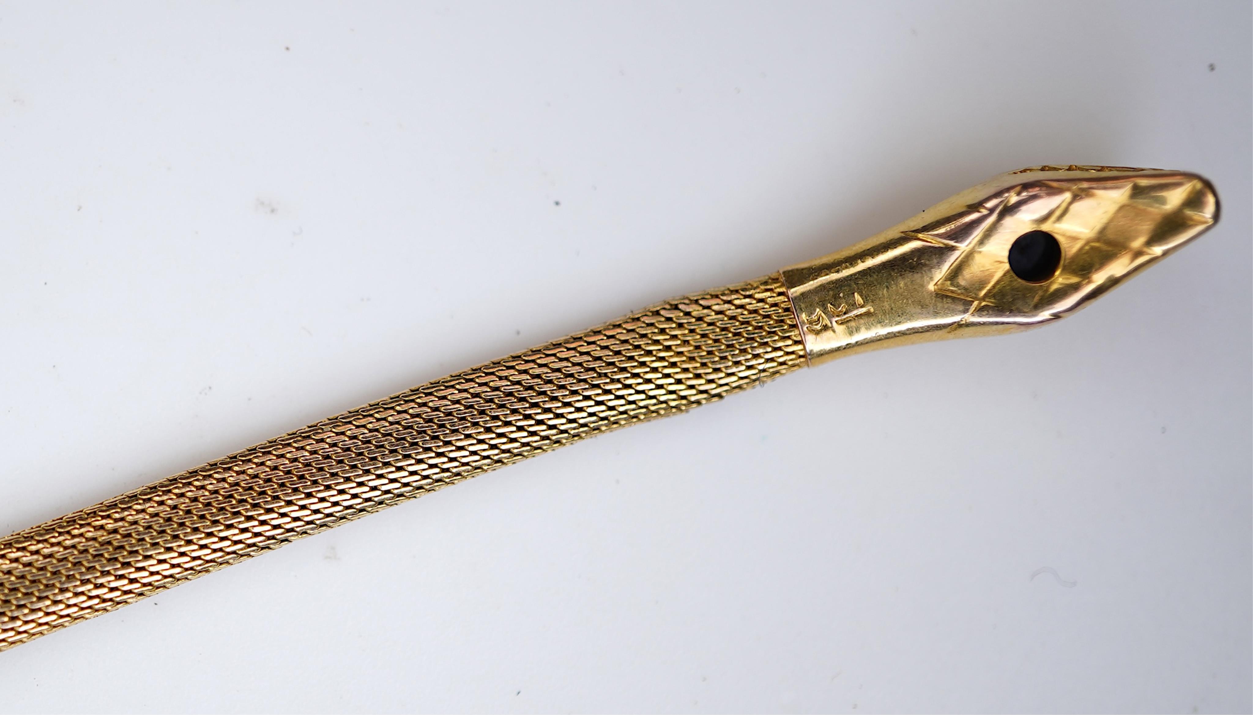 A Victorian gold, ruby and sapphire bracelet, mid 19th century